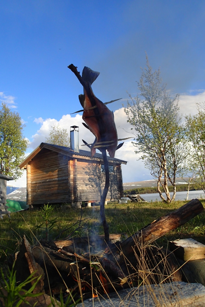 A simple sauna far from civilization with a smoked trout looking on. Photo by Cate and Logan Mitchell.